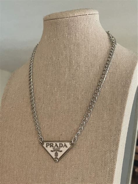 prada necklace white|Prada silver tag necklace.